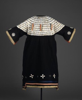 A woman's dress produced by an unknown Sioux artisan between 1875 and 1900.